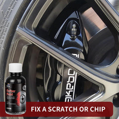 SENVEN black caliper paint drying on wheel with heat resistance visible.