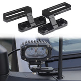 Seven Sparta dual pod light mount with sliding rail on Bronco, adjustable light positioning.
