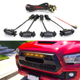 Seven Sparta grill LED lights with amber glow on a black shell for Toyota Tacoma TRD Pro
