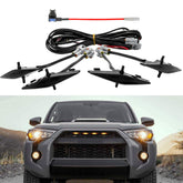 Seven Sparta grille light in smoke shell emits amber beam for bold truck styling.