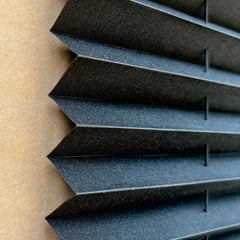 SHADEPLUS RV pleated shade fabric close-up in black, showing durable texture.