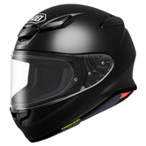 Shoei RF-1400 front view highlights aerodynamic shape for smoother highway rides.