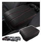 Sinminou center console cover with red lines embossing adds refined texture and protection.