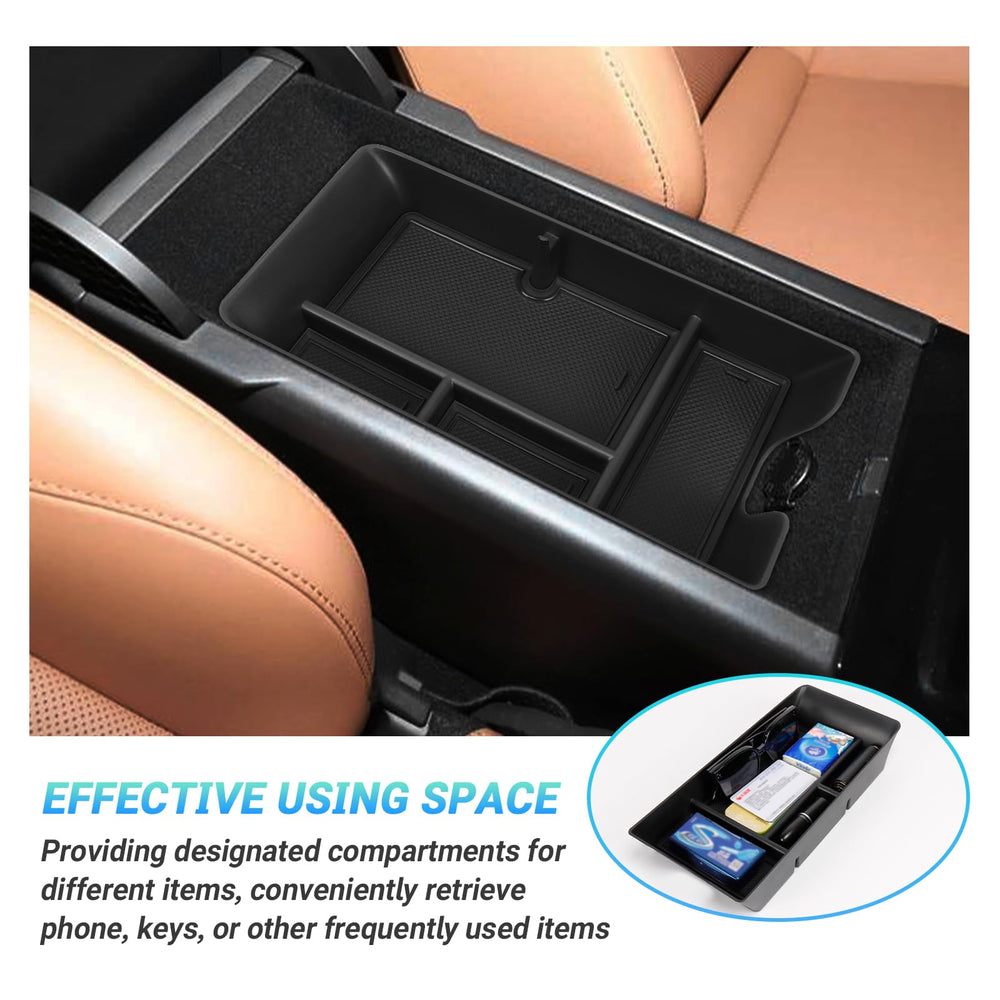 Coin and lipstick slots keep small essentials organized in the Camry.