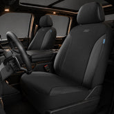 Skechers Work Seat Covers on the front seat with leather and Oxford fabric for durable protection.