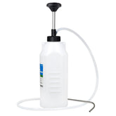 SMOTIVEPRO pump in action dispensing engine oil with precision in tight spaces.
