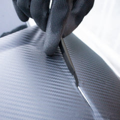 Spanno work gloves protect hands during cutting and smoothing tasks.