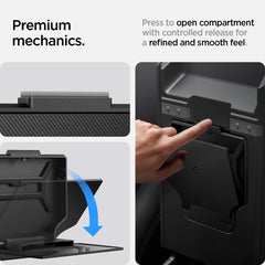 Spigen One-Tap Hidden Storage Box under-armrest mount detail in a Tesla Y cabin.