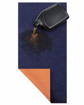 SpillShieldMC oil change mat cut-to-fit under car for precise containment