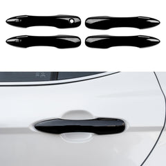 Spotrim door handle cover on a Toyota Camry front left, protecting against scratches.