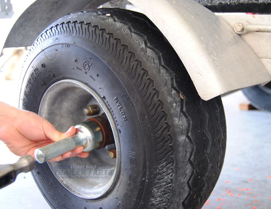 Sturdy Built 1.98 dust cap tool aiding removal with controlled wiggling.
