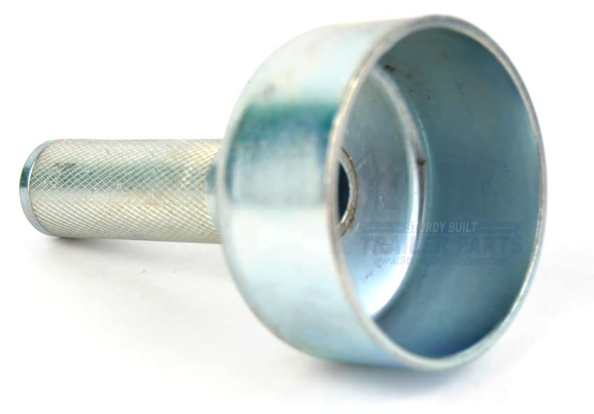 Sturdy Built trailer dust cap install tool in angled view, easing cap alignment and protection.