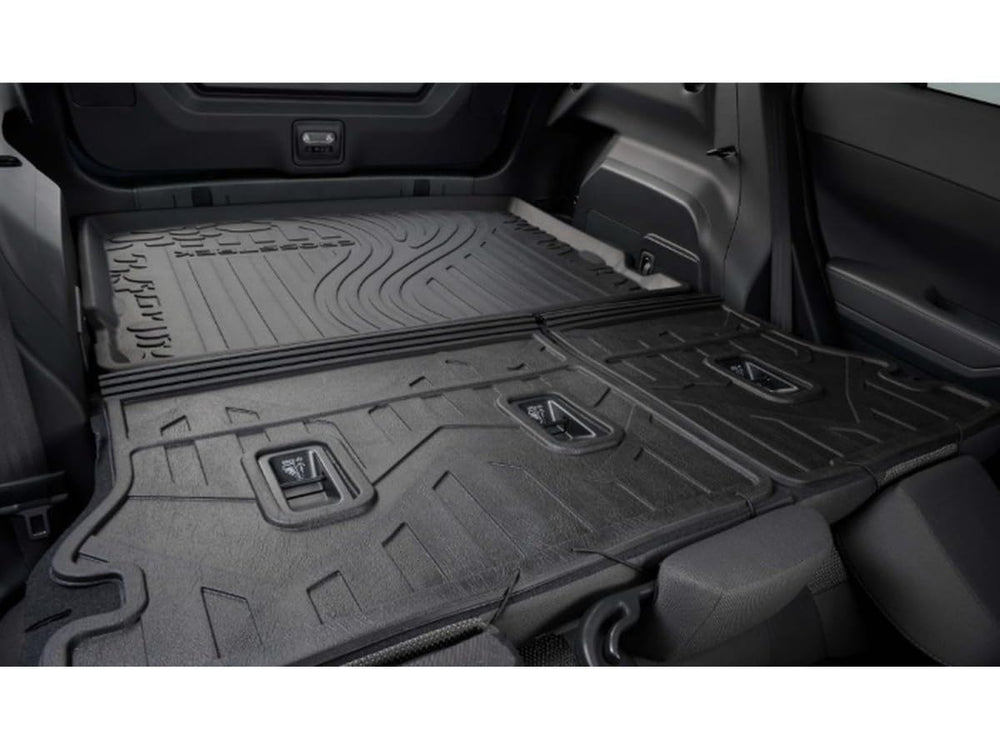Crosstrek rear seats protected during loading of large items with the OEM protector