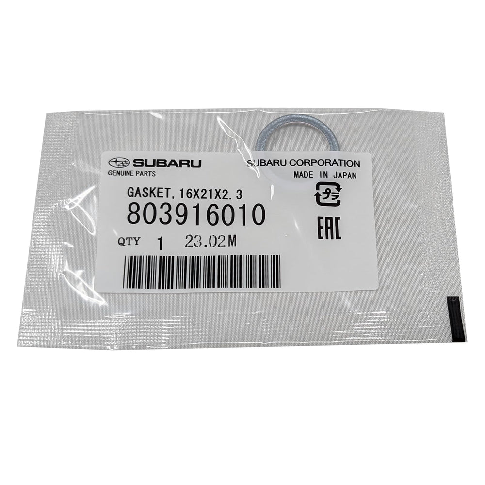 Subaru crush washer close-up, 803916010, highlighting seal integrity during oil changes.