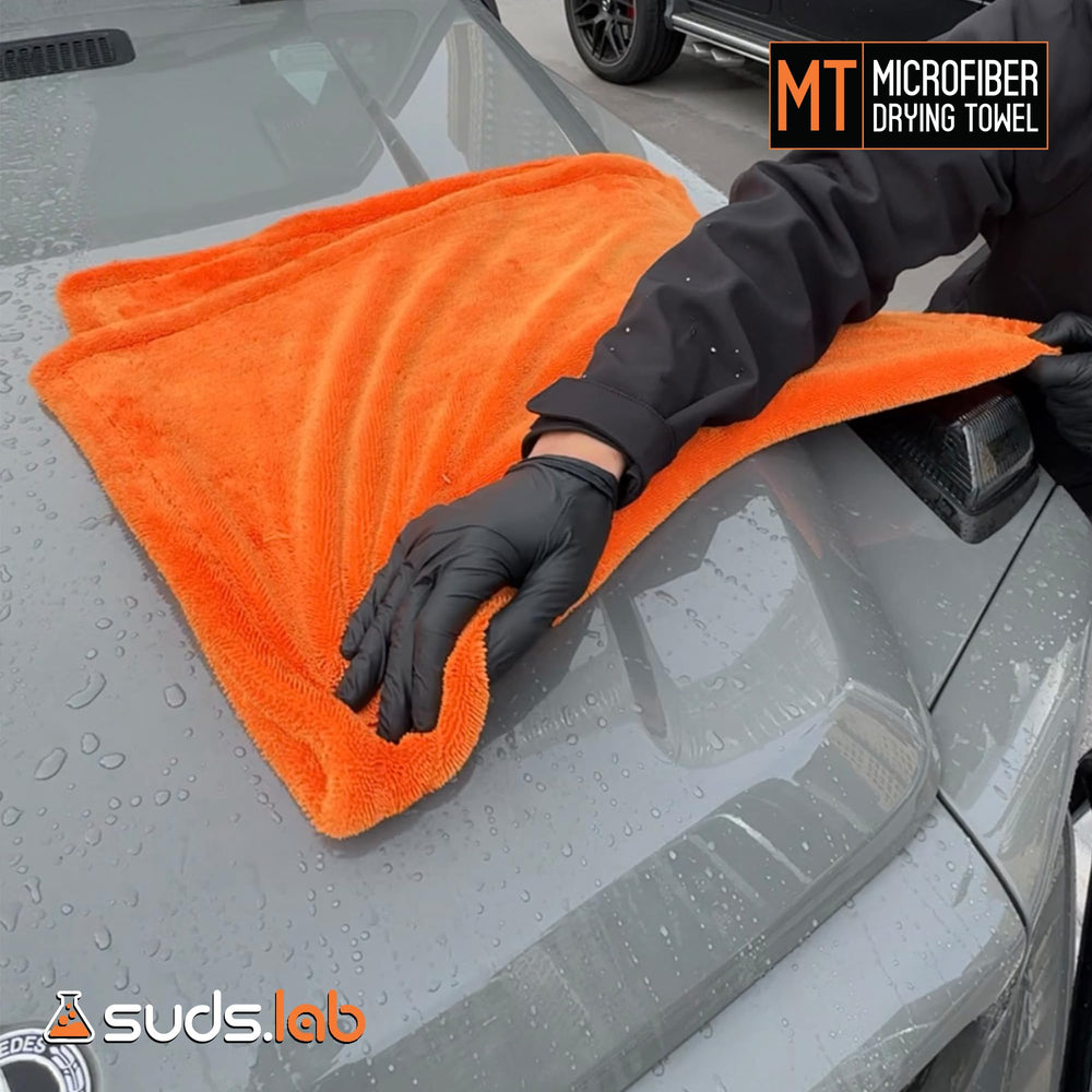 Suds Lab towel detailing chrome components with a lint-free shine
