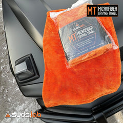 Suds Lab microfiber towel promoting eco-friendly detailing with reduced waste