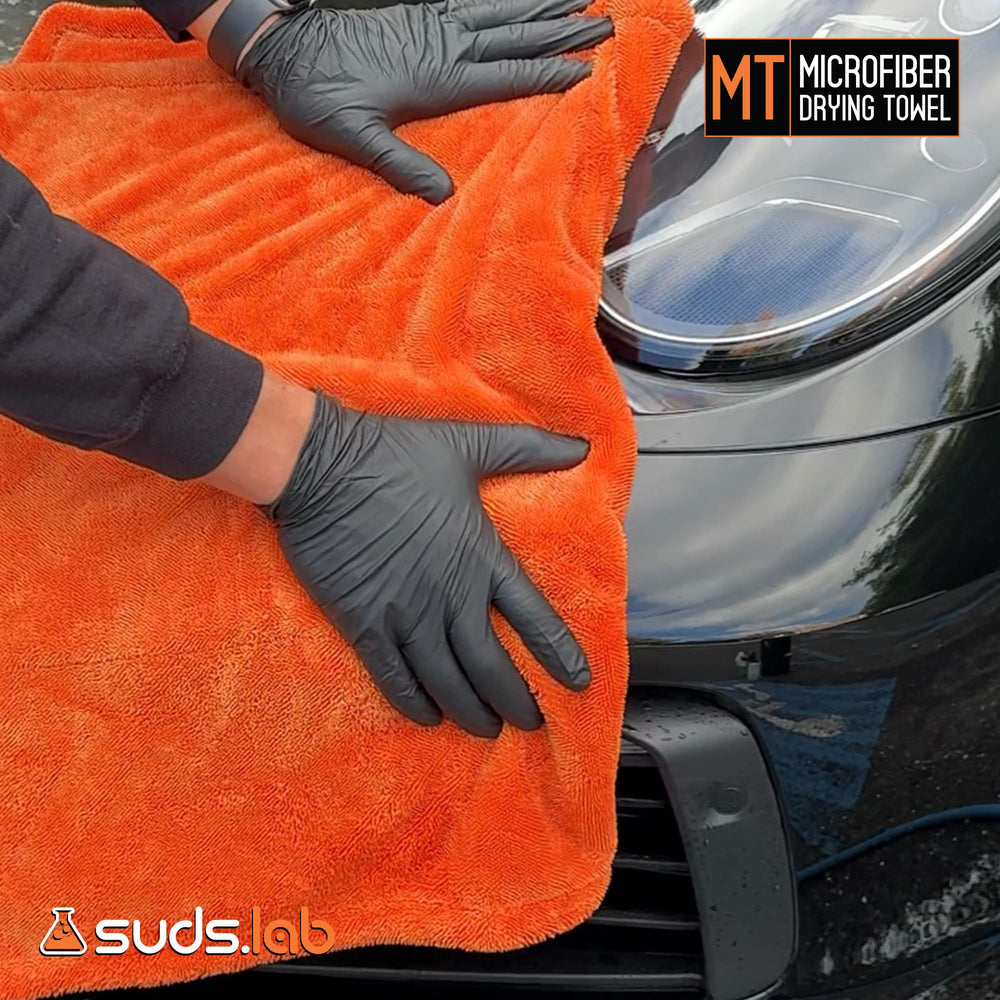 Suds Lab microfiber towel around wheel wells for thorough moisture removal