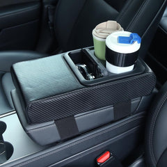 Supin armrest pad with elastic strap stays fixed during drives.