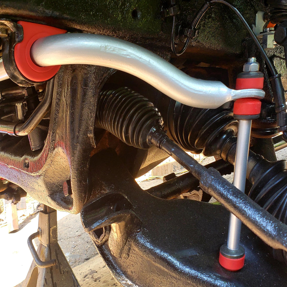 Suspension Dudes Code Red bushings close-up shows durable polyurethane construction.