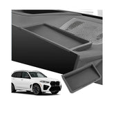 SXCY BMW X5 dashboard tray front view showing seamless fit behind the screen