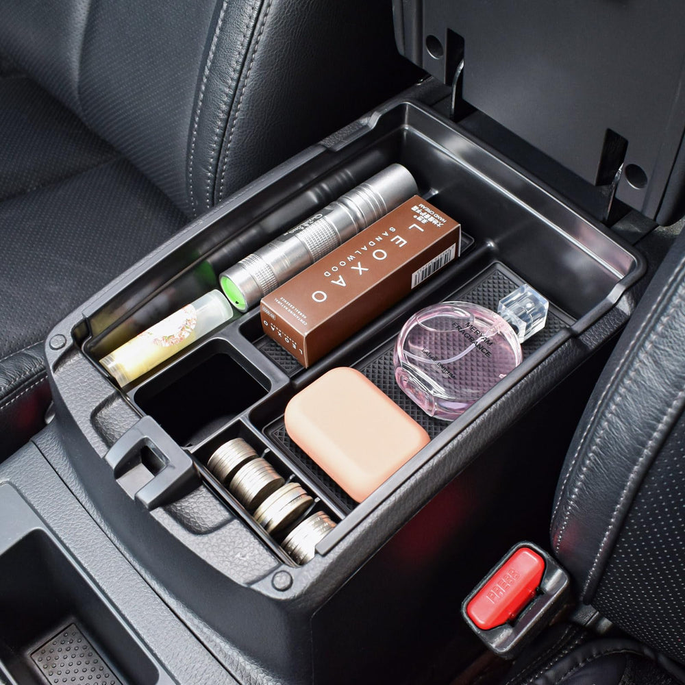 TACOBRO center console tray installs in Nissan Rogue for quick organization.