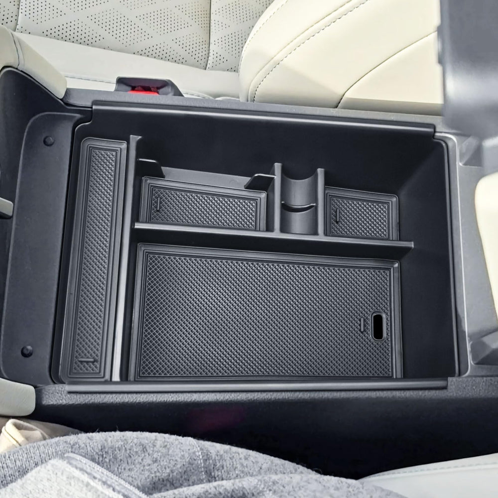 TACOBRO matte finish center console tray blends with Murano interior aesthetics.