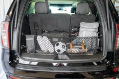 TacoNets envelope cargo net Escalade fit keeps tackle and gear in place.