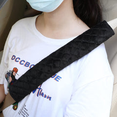 Tatuo easy-install seatbelt pad with bottom stickup for quick, tool-free fitting.