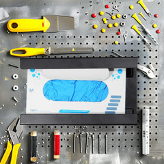 Tcevily holder stores towels and tissue near gloves for convenience
