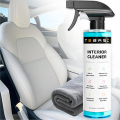 TEBASIC Tesla interior cleaner bottle in action on the dash, protecting white vegan leather.