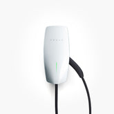 Tesla Wall Connector installed outdoors for versatile charging in all weather.