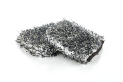 The Rag Company Cyclone Ultra Wheel Mitt used to clean grill surfaces safely.