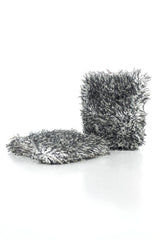 The Rag Company Cyclone Ultra Wheel Mitt on wheels for easy contaminant release during washing.