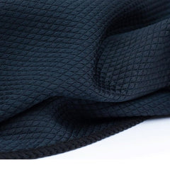 The Rag Company towel closeup shows diamond texture that lifts grime efficiently.