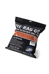 The Rag Company Eagle Edgeless 500 red towels during a water-absorption test.