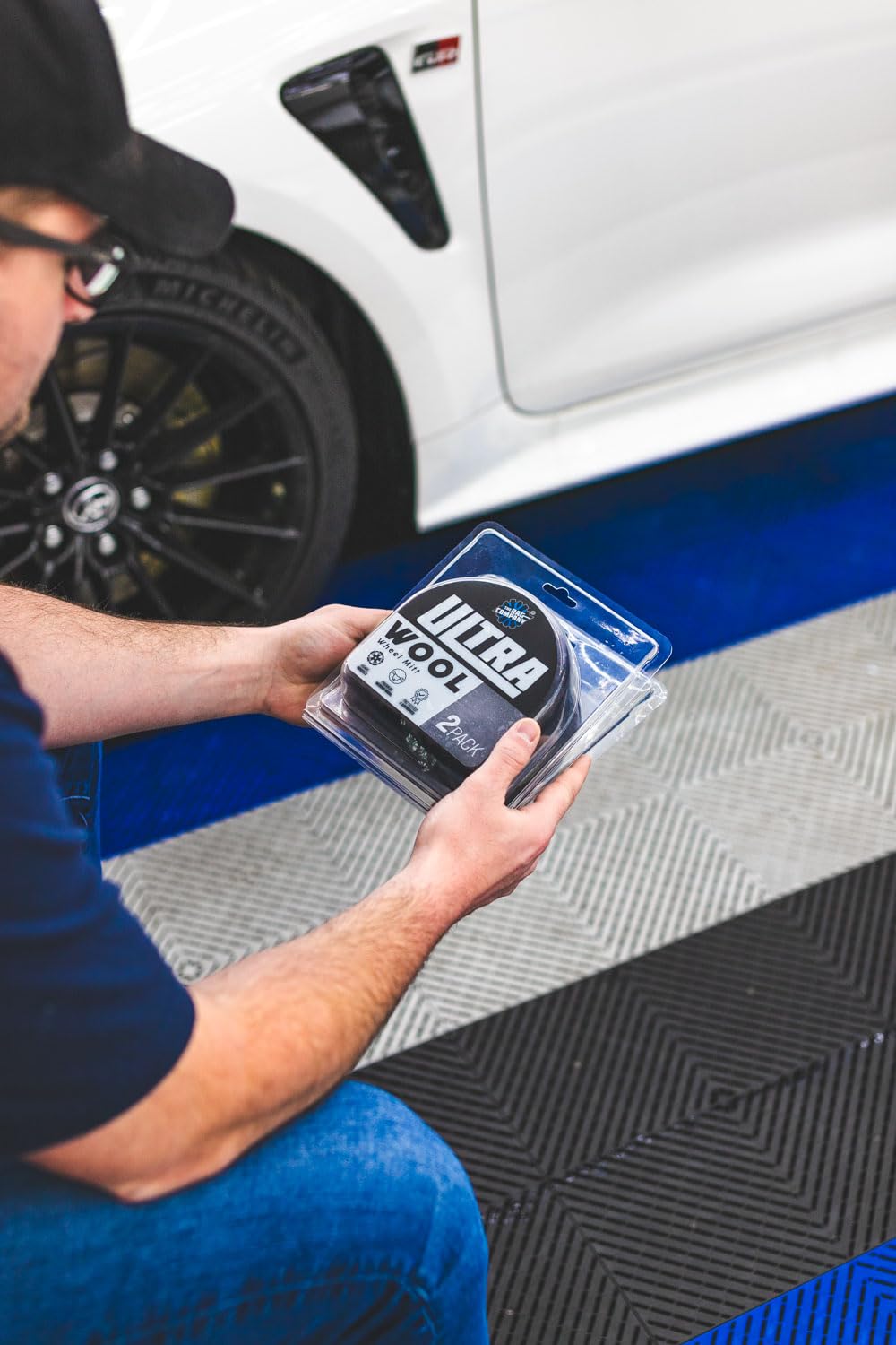 Marino wool mitt removes dirt and brake dust with a light scrub.