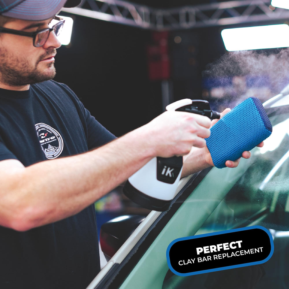 Bug removal on a car using The Rag Company Ultra Clay Scrubber.