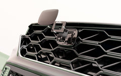 Installation process showing alignment and mounting of the radar protector on CR-V.