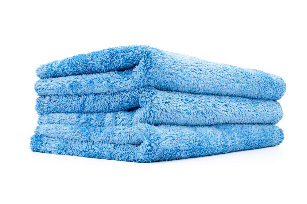 The Rag Company Eagle Edgeless 500-3Pack blue towels folded, ideal for fast detailing prep.