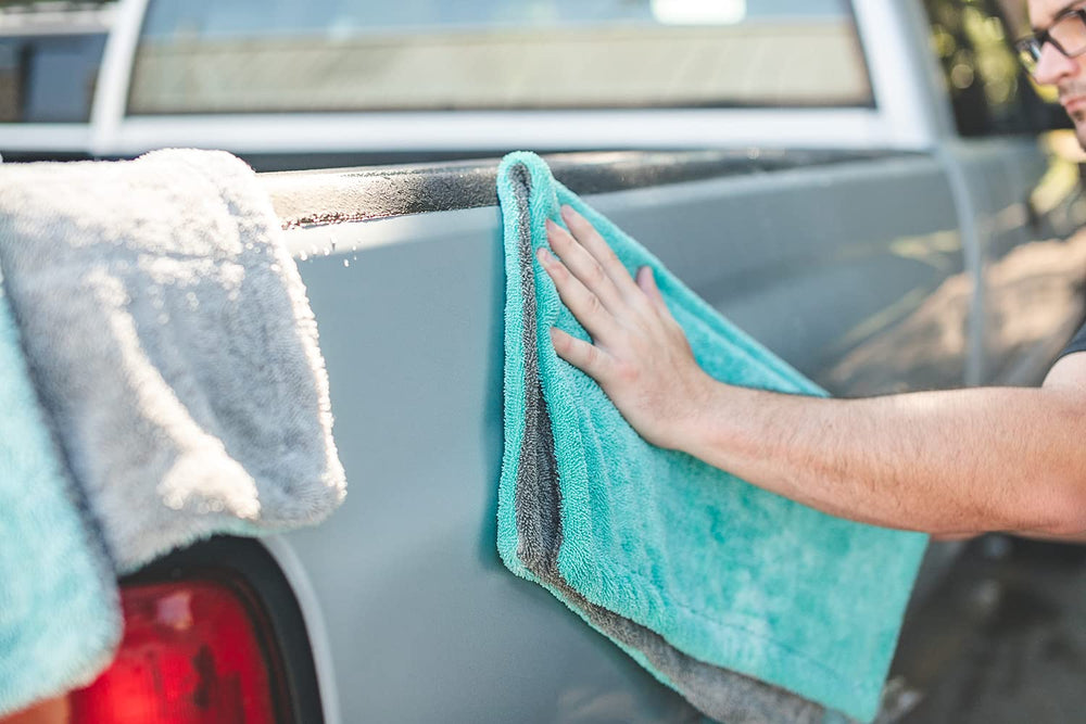 Liquid8r in action during a car wash illustrating scratch-free drying results.