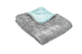 The Rag Company Liquid8r towel close-up showing 1100 GSM absorbency for fast drying.