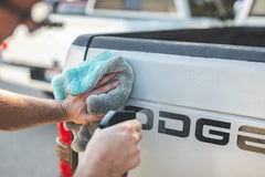 The Rag Company Liquid8r towel shown drying a vehicle with glide