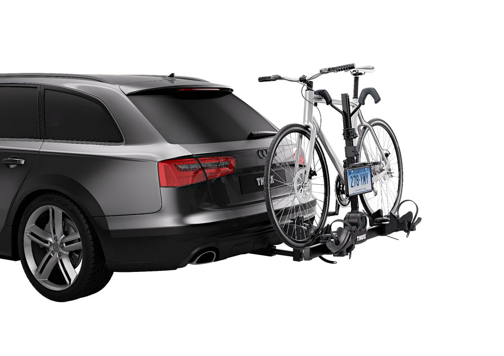 Thule black license plate holder attached to a rack with secure fit