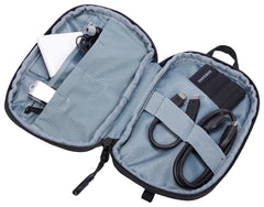 Thule Subterra PowerShuttle elastic loops securing chargers and earbuds during transit