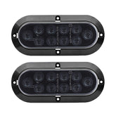 TMH 6-inch oval smoked lens red LED trailer tail light front view, durable waterproof design.