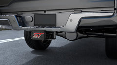 Rear vehicle with TOEASYTY hitch cover enhancing sport identity.