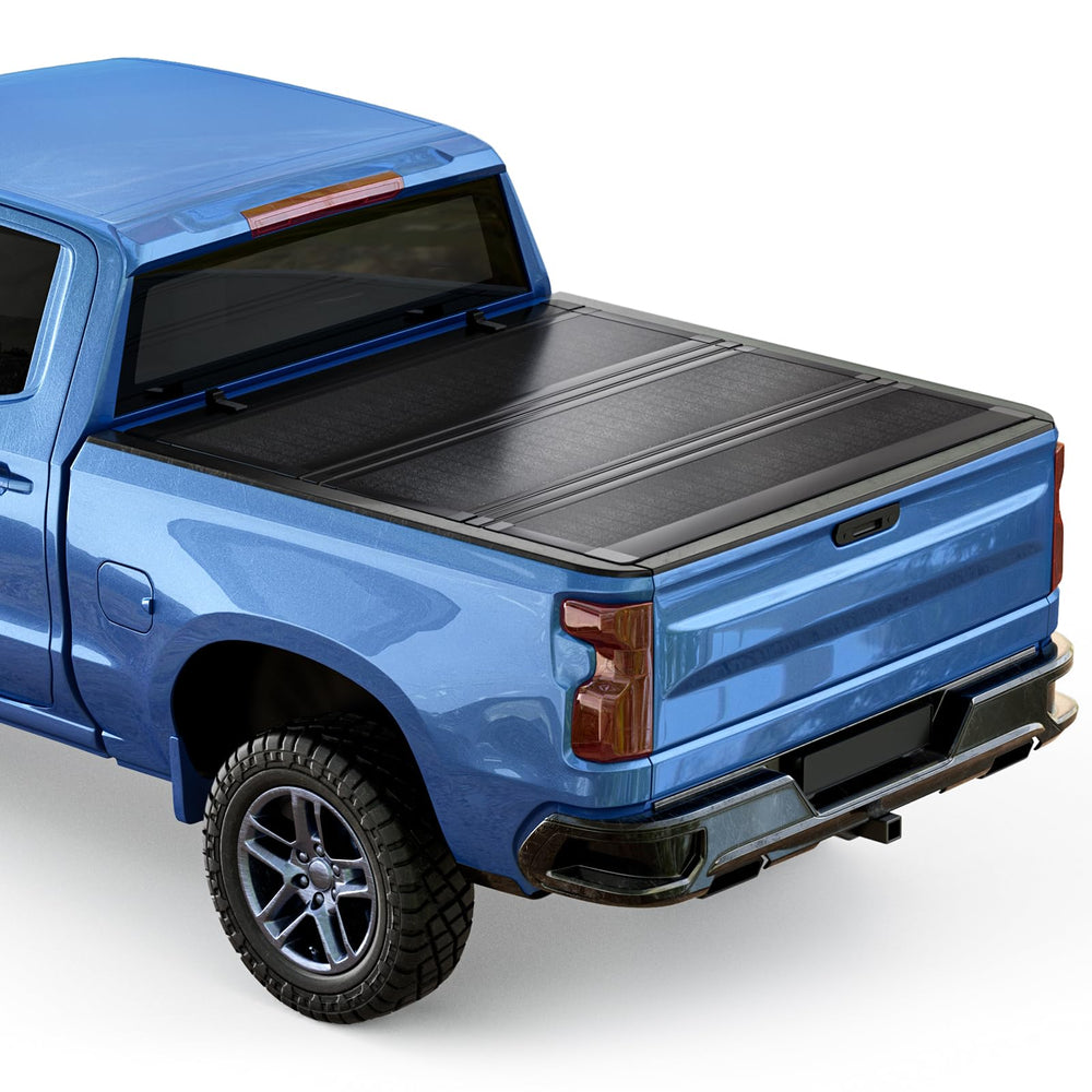 Tono King low-profile flip-up cover on a Chevy Silverado bed provides secure weather protection.
