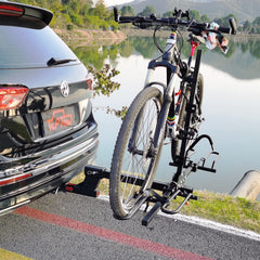 TOPTOW towing setup with boat or bike rack shows versatile accessory compatibility.