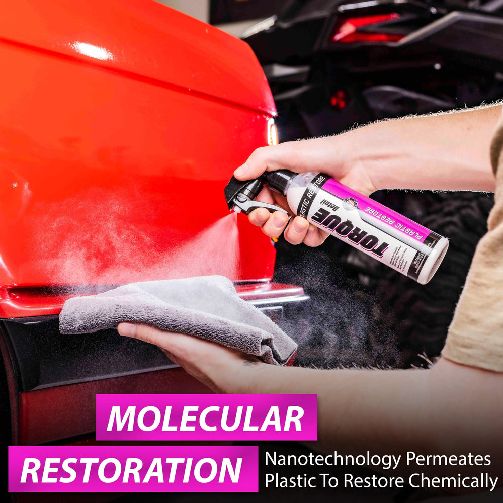 Torque Detail Trim Restorer spray demonstrates application on an interior panel.