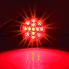 Traberm round red marker light with 13 LEDs and reflector for clear signaling.
